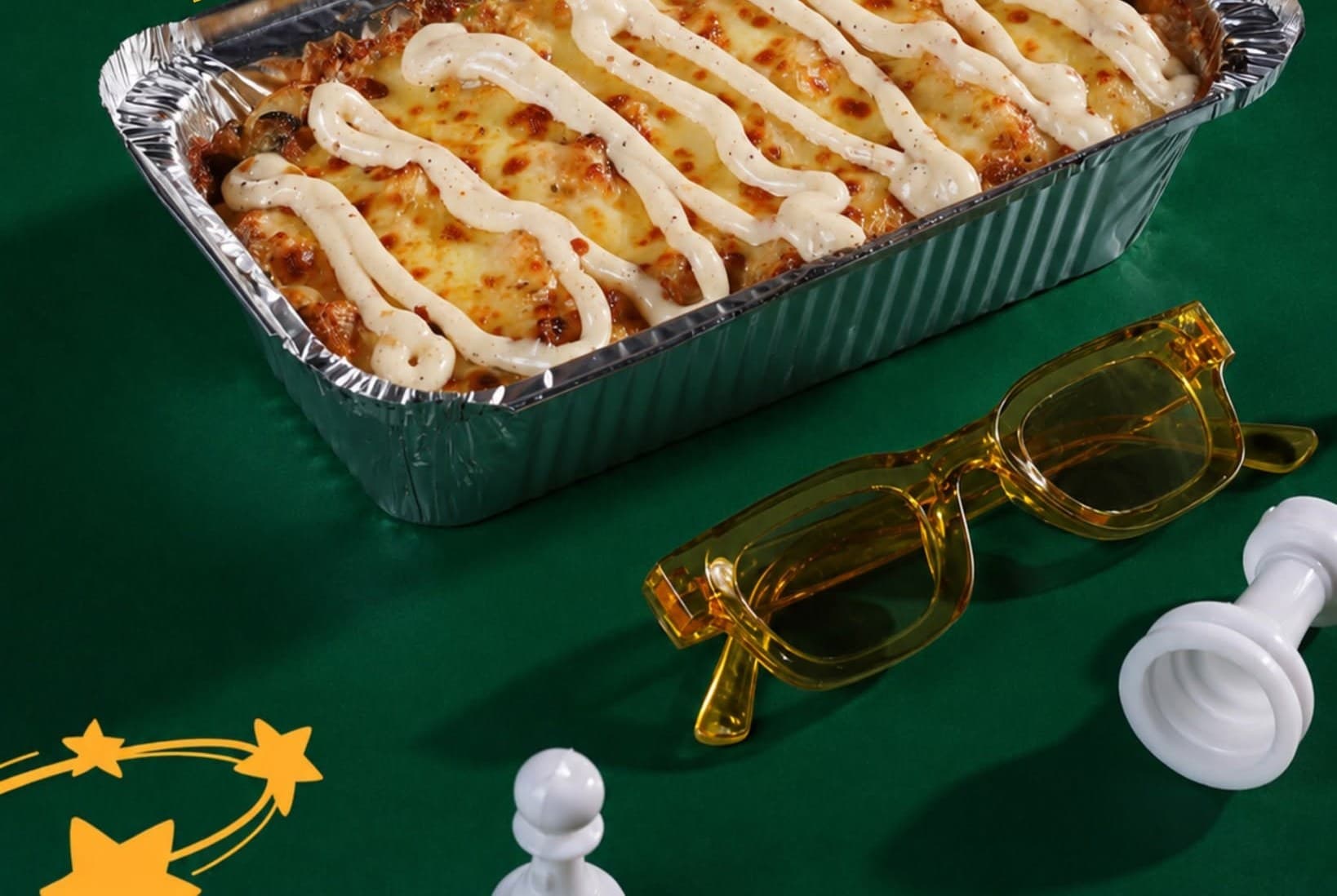 A fresh Layali bake, straight out of the oven, on the prep table